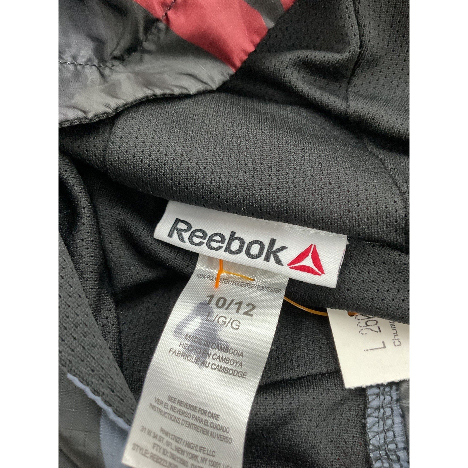Chumpa Niño L (Reebok)