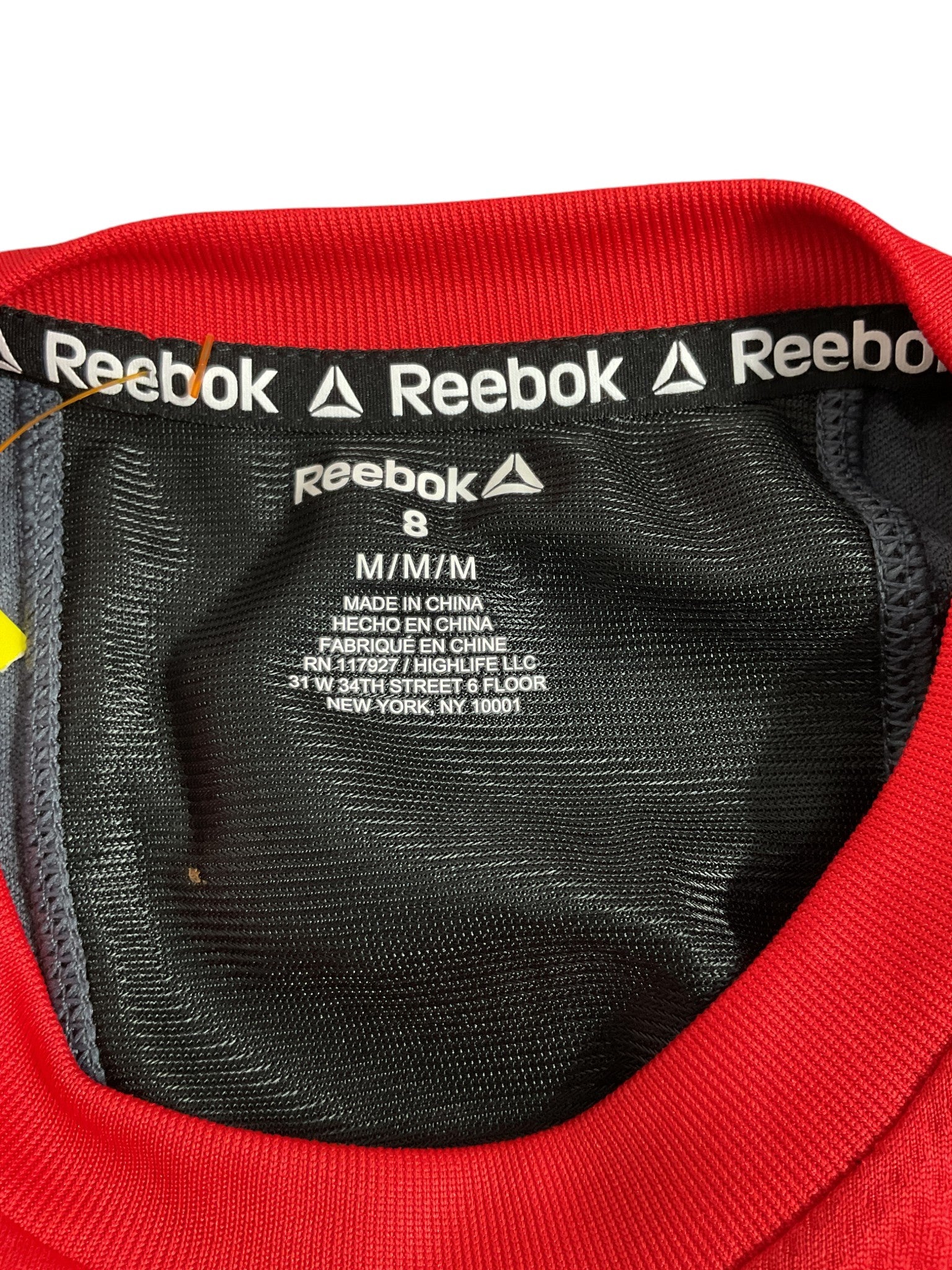 Camisa niño 8 (Reebok)