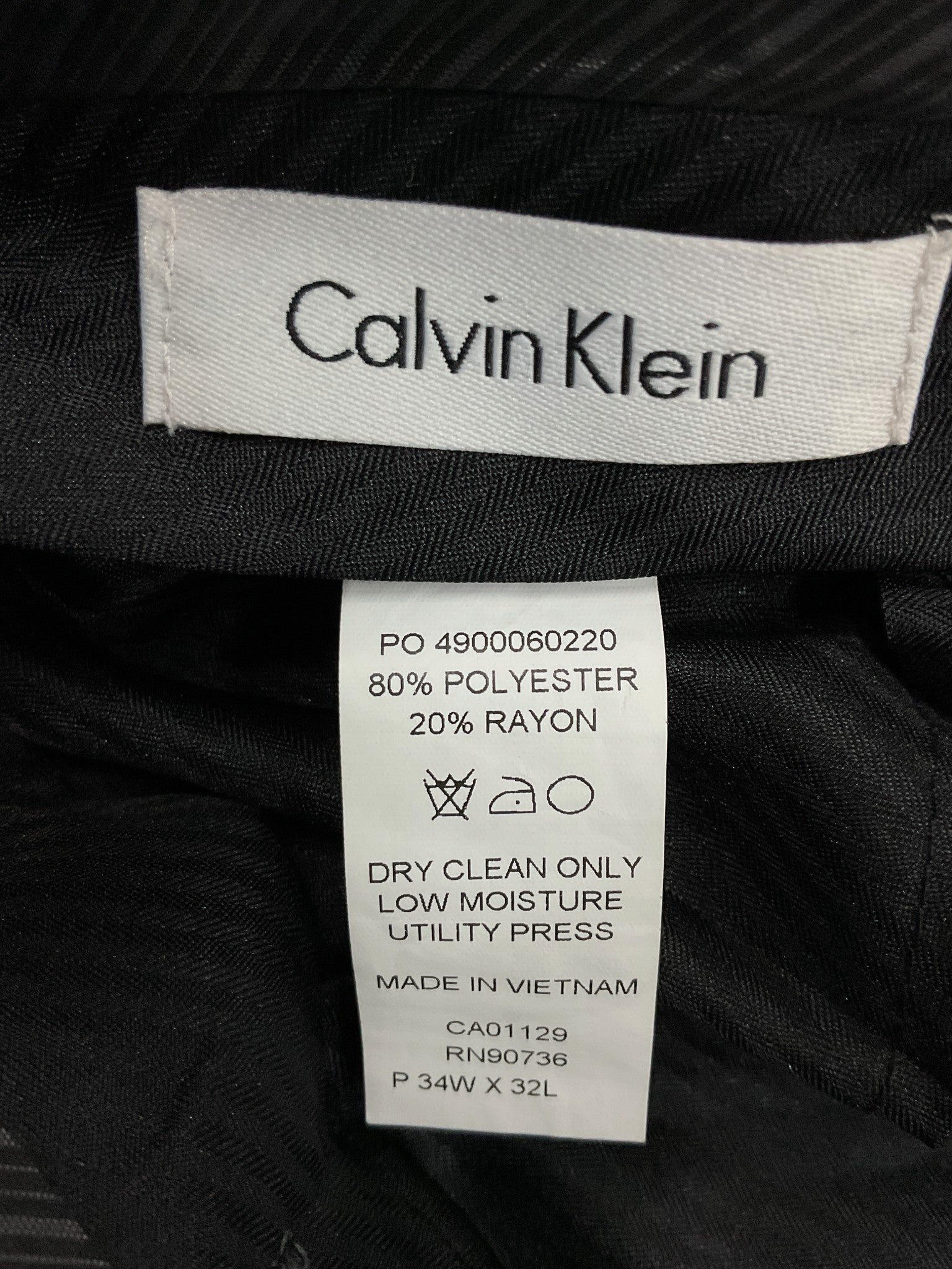Pantalón 34*32 (Calvin Klein)