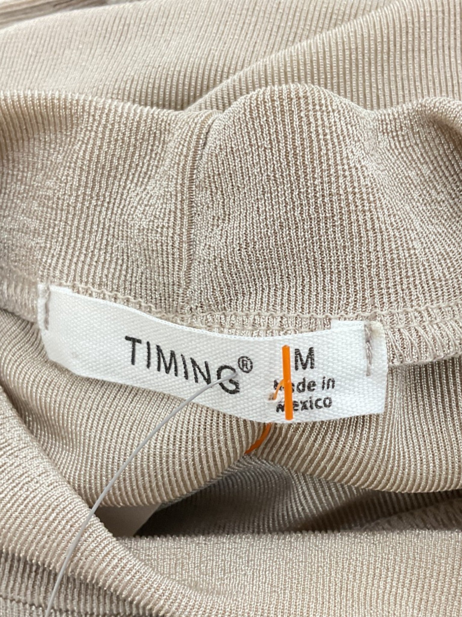 Blusa M (Timing)