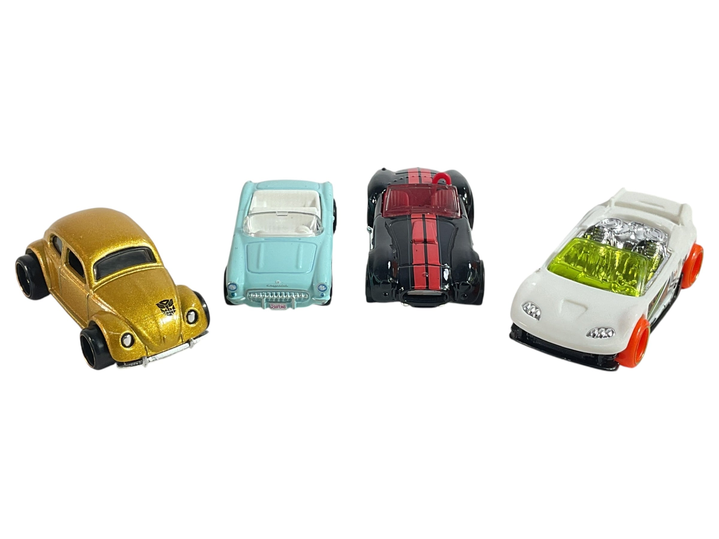 Vista superior de 4 carritos de juguete